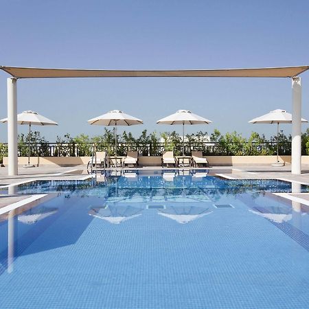 โมเวนพิคโฮเต็ล อพาร์ตเมนต์ อัล มัมซาร์ ดูไบ Aparthotel ภายนอก รูปภาพ The swimming pool at the hotel