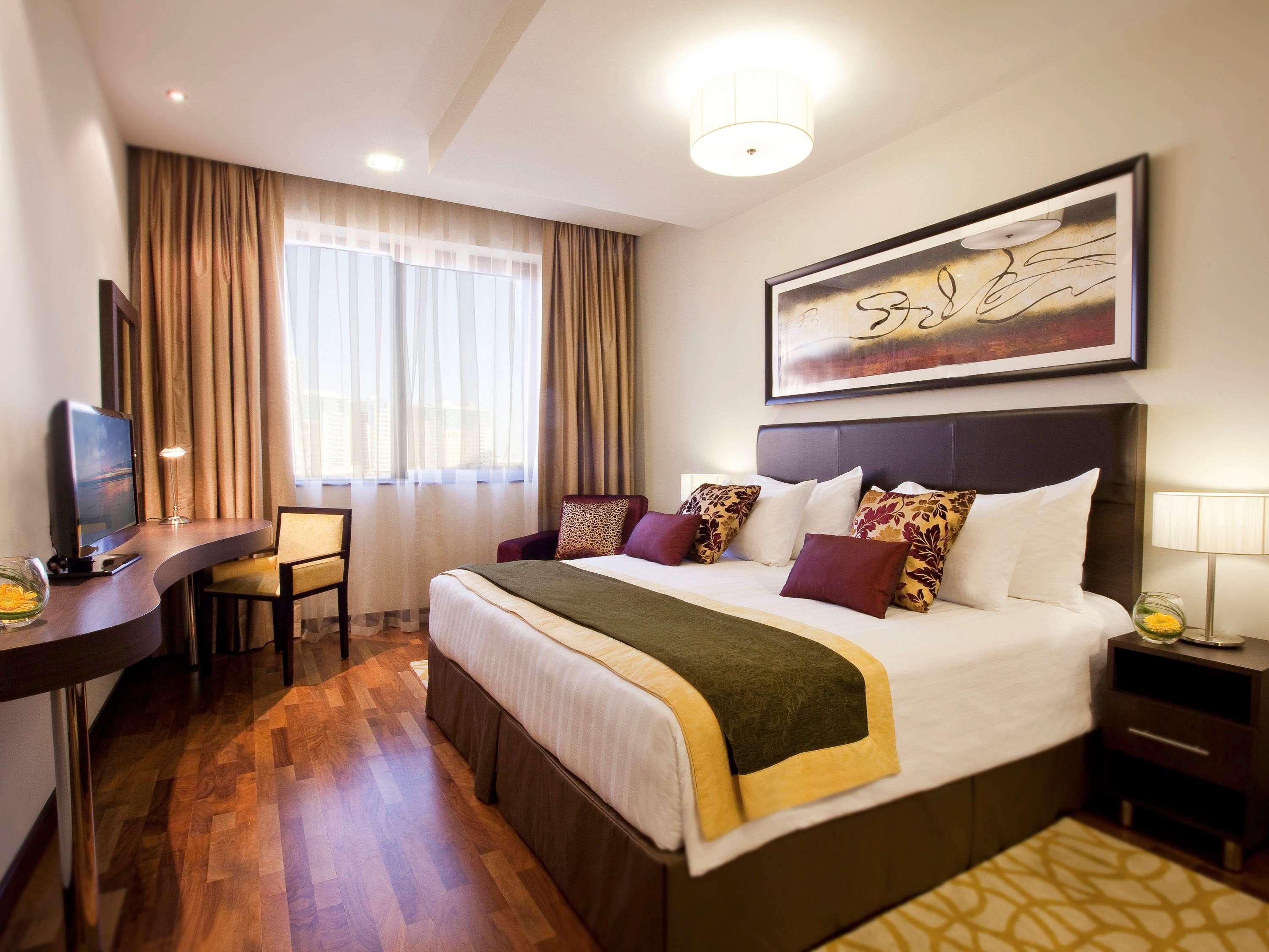 โมเวนพิคโฮเต็ล อพาร์ตเมนต์ อัล มัมซาร์ ดูไบ Aparthotel ภายนอก รูปภาพ A bedroom at the hotel