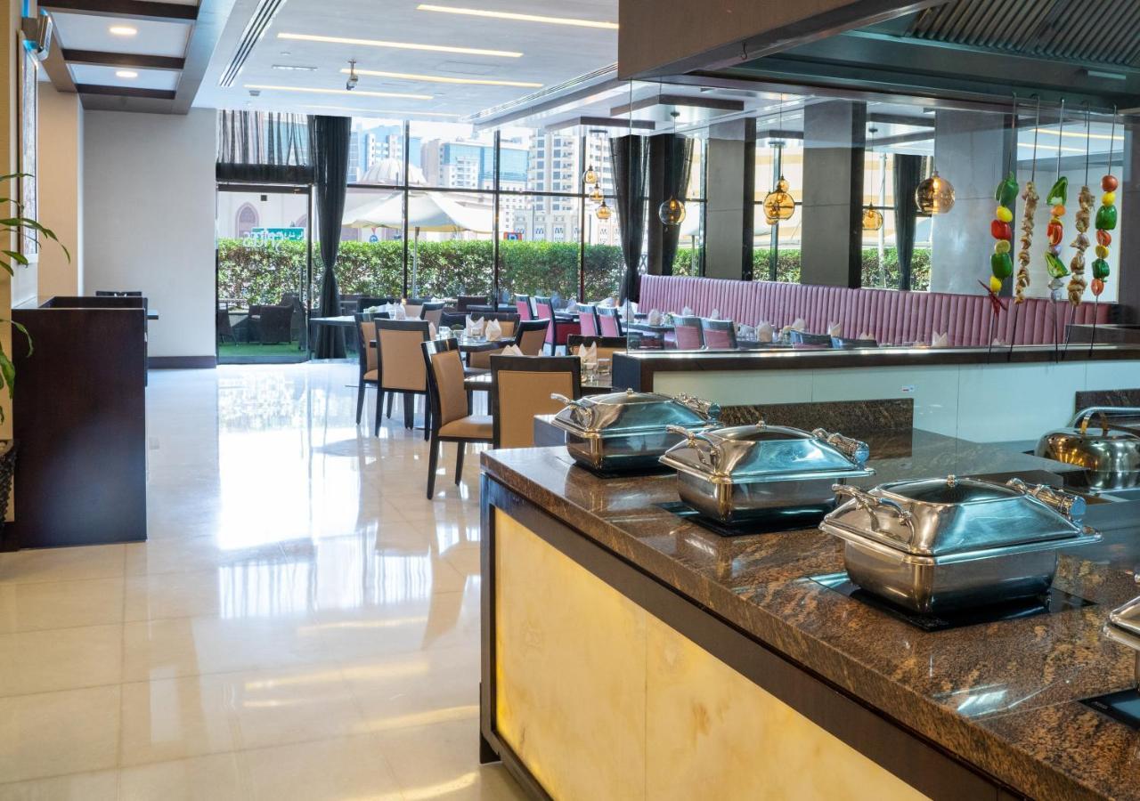 โมเวนพิคโฮเต็ล อพาร์ตเมนต์ อัล มัมซาร์ ดูไบ Aparthotel ภายนอก รูปภาพ The restaurant