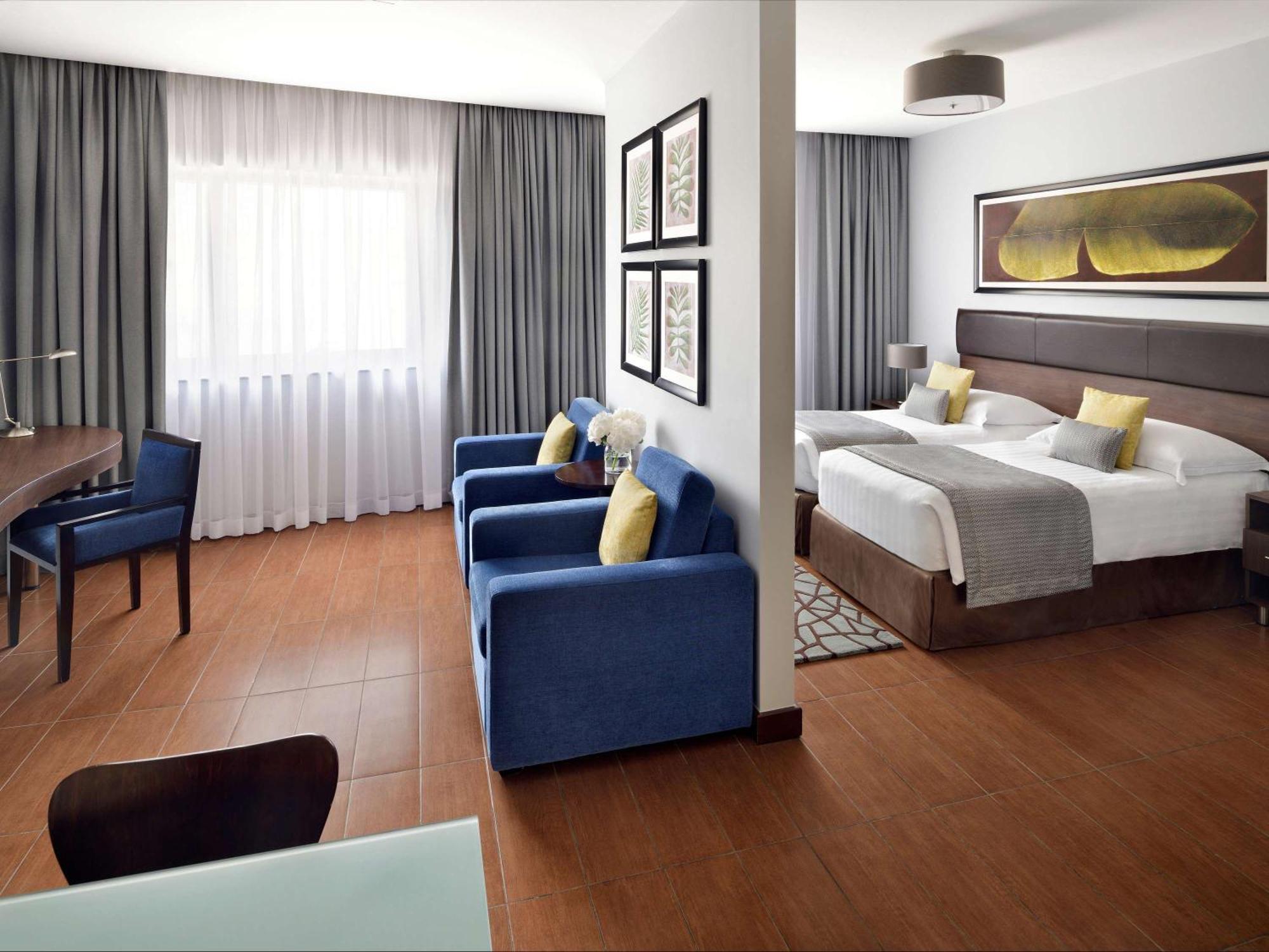 โมเวนพิคโฮเต็ล อพาร์ตเมนต์ อัล มัมซาร์ ดูไบ Aparthotel ภายนอก รูปภาพ A room at the hotel