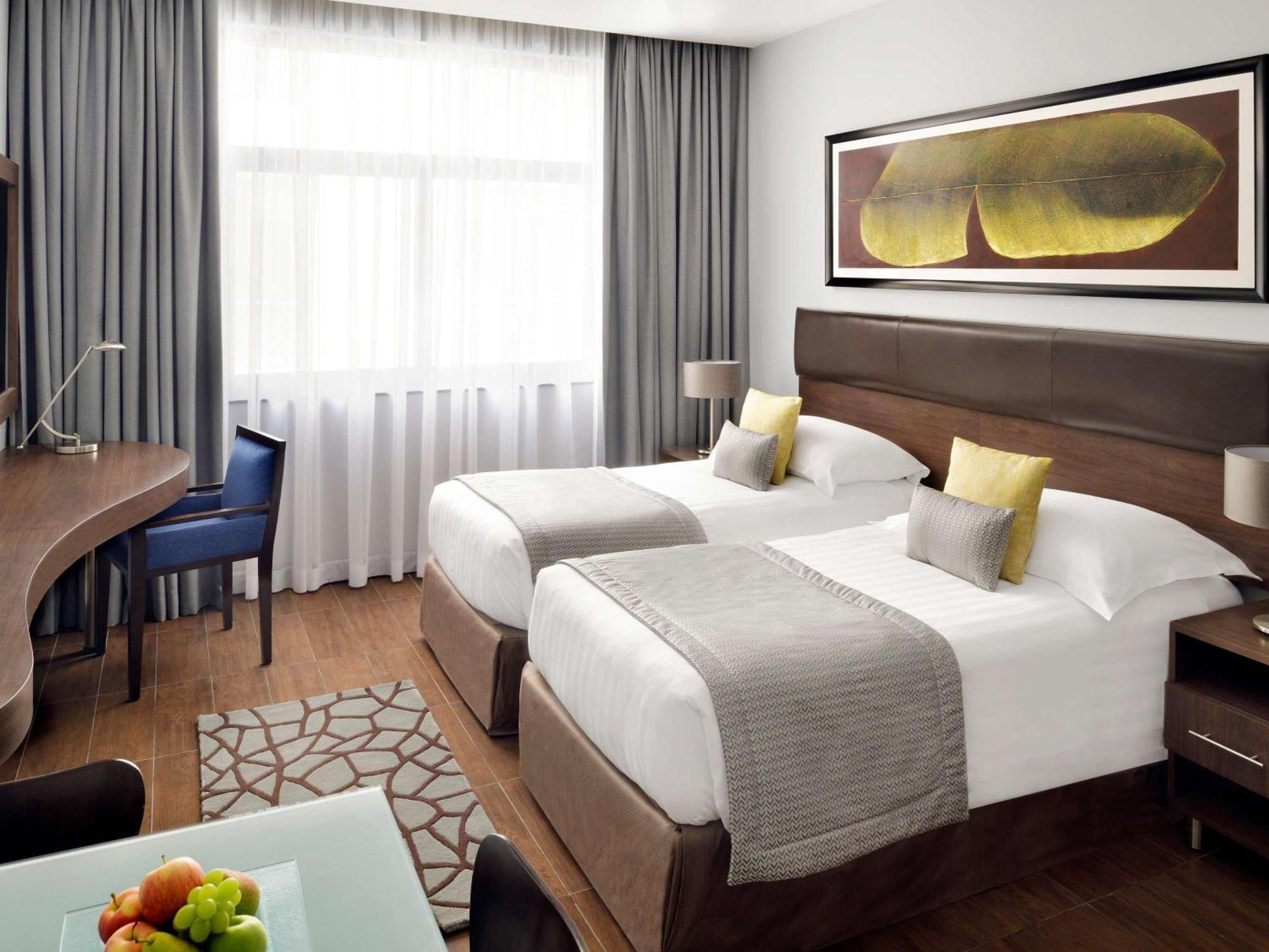 โมเวนพิคโฮเต็ล อพาร์ตเมนต์ อัล มัมซาร์ ดูไบ Aparthotel ภายนอก รูปภาพ A room at the hotel