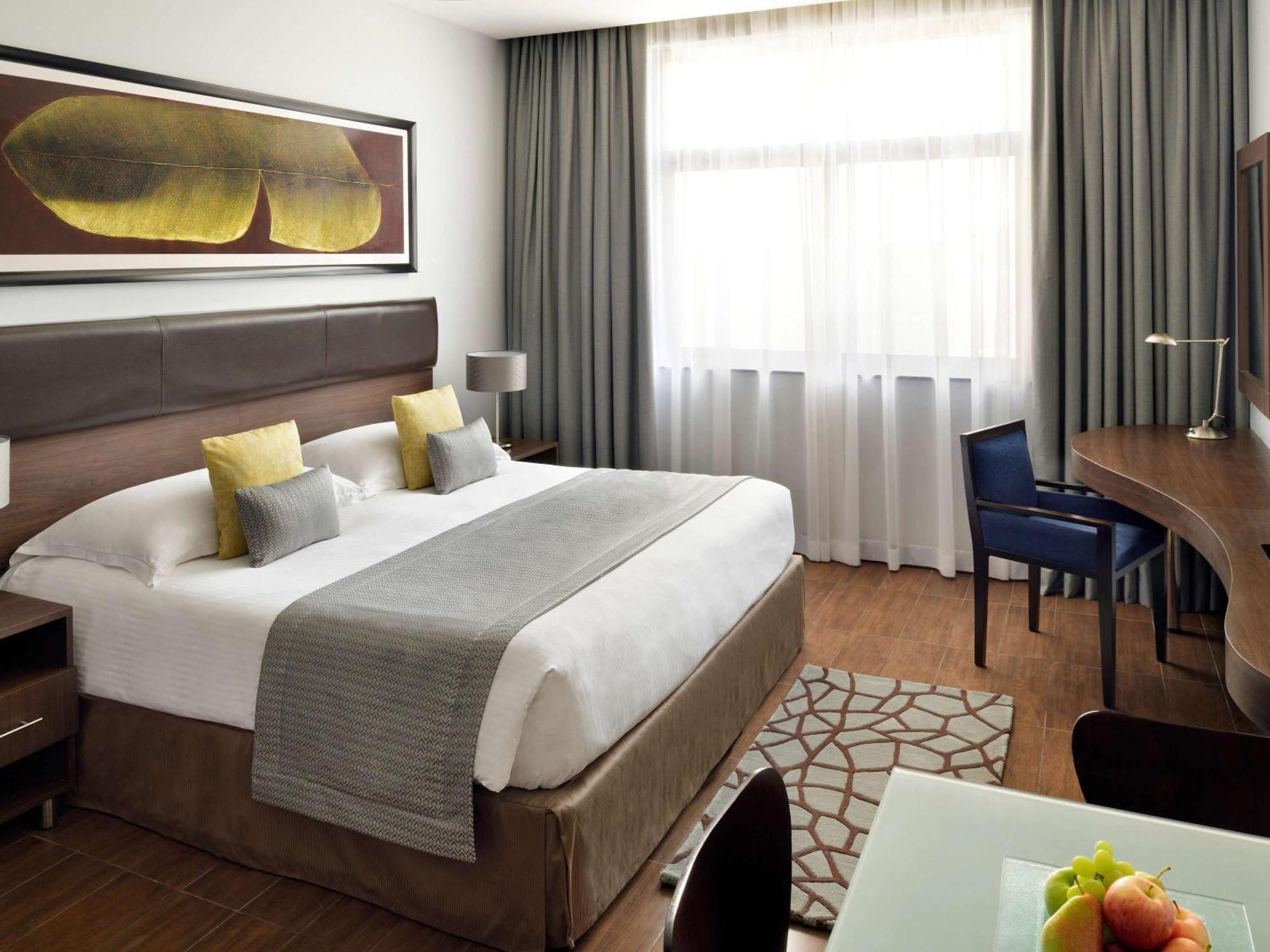 โมเวนพิคโฮเต็ล อพาร์ตเมนต์ อัล มัมซาร์ ดูไบ Aparthotel ภายนอก รูปภาพ A room at the hotel